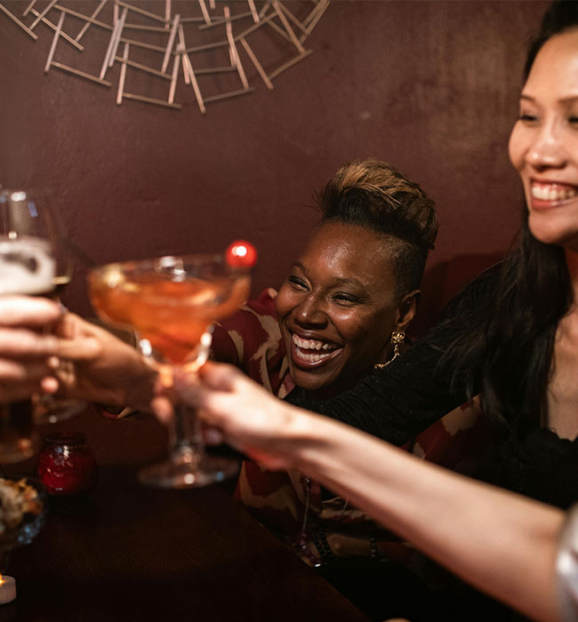 ladies toasting their drinks