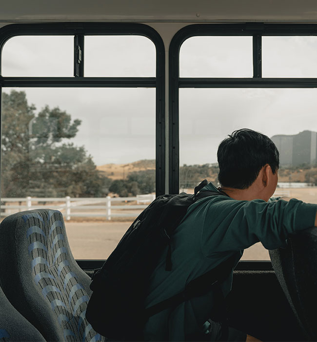 guy traveling on a mini bus in indianapolis